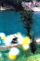 Ϫ